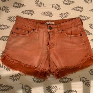 Free people orange washed distressed jeans shorts